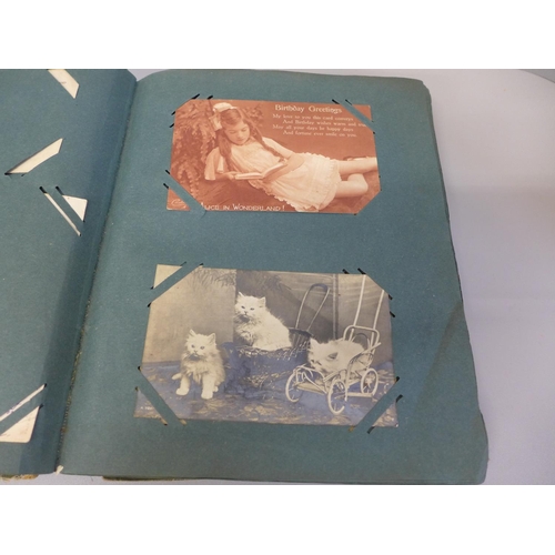 676 - A postcard album, 185 cards including RPPs