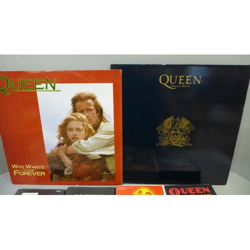 688 - Three Queen LP records and two 12