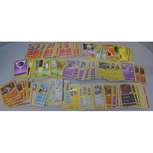 696 - A collection of Pokemon cards including nineteen base set, but mainly 2021