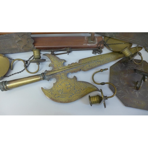 716 - A box of metal ware including a brass pikestaff head, a sun dial, balance scales, etc.