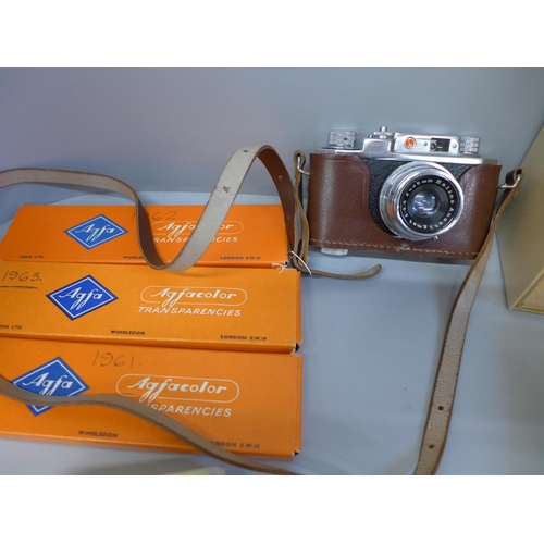 719 - Camera slides - UK holiday snaps 1960's and 1970's, an exposure meter and a camera