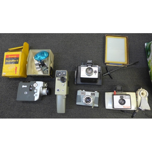 725 - Two Polaroid cameras, camera accessories and two cine cameras