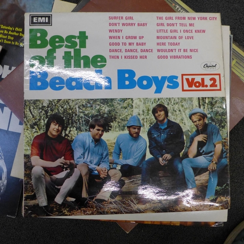 737 - Twenty-nine 1960's and later LP records:- The Monkees, Diana Ross and The Supremes, Beach Boys, Leon... 