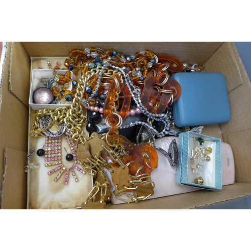 740 - Costume jewellery and a travel set