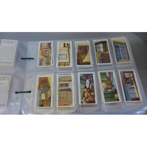 744 - A collection of cigarette card sets, mainly Wills and Players, including military, transport, vintag... 