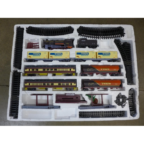 774A - Tri-ang 'Big Big Train' model rail locomotive, three coaches, one a/f, circus wagon, track with poin... 