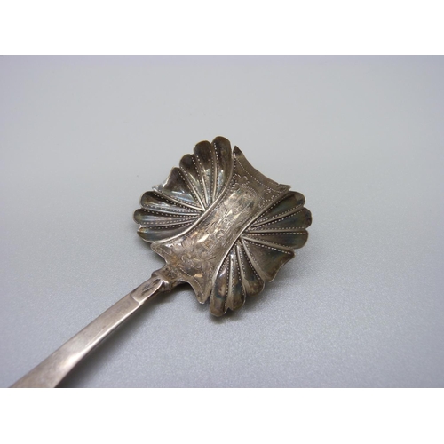 827 - A George IV silver caddy spoon, Birmingham 1824, maker JC, a/f, repaired at stem/bowl