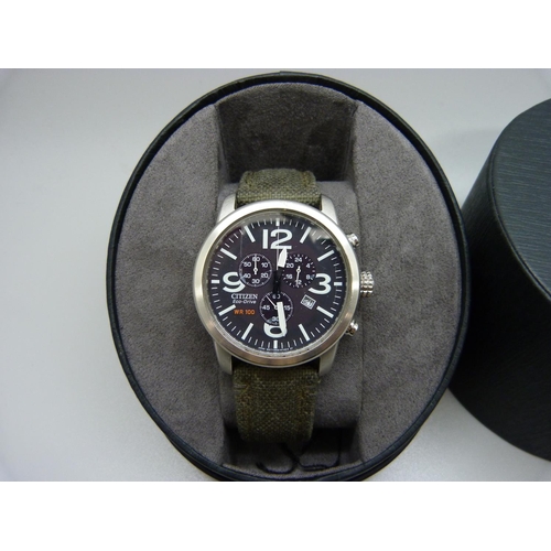 846 - A Citizen Eco-Drive WR100 Chronograph wristwatch, boxed, glass scratched