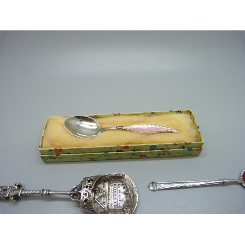 852 - A silver pickle fork, five silver spoons including three enamel and a caddy spoon, 57g