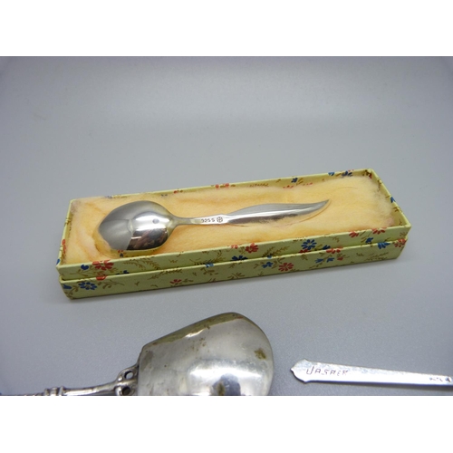 852 - A silver pickle fork, five silver spoons including three enamel and a caddy spoon, 57g