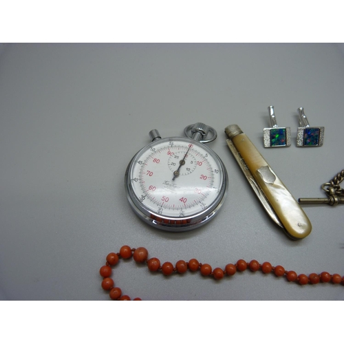 863 - A stop watch, a coral necklace, a pair of silver and opal cufflinks, a pair of drop earrings and a s... 