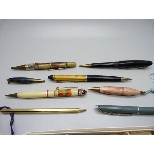 878 - A collection of mechanical pencils including London Airport and 1953 Coronation