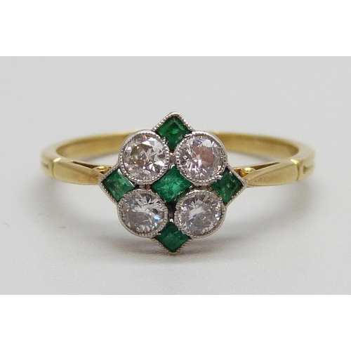 894 - An 18ct gold, emerald and diamond ring, 1.8g, N