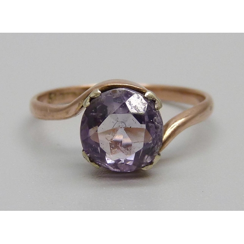 901 - A 9ct rose gold amethyst solitaire ring, Chester 1921, 1.4g, K