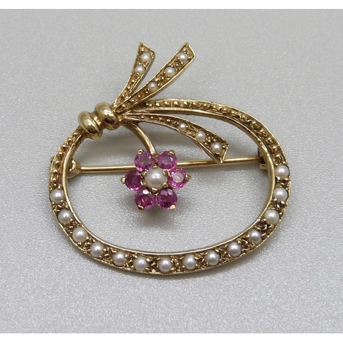 903 - A 9ct gold, ruby and pearl brooch, 5.3g, 32mm