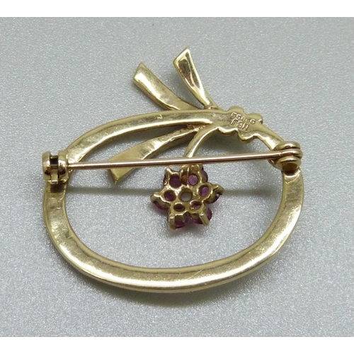 903 - A 9ct gold, ruby and pearl brooch, 5.3g, 32mm