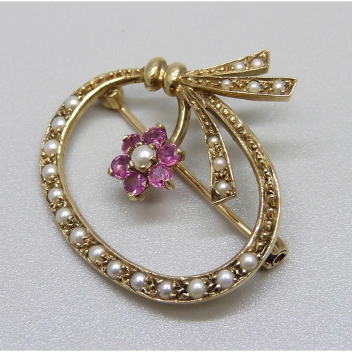 903 - A 9ct gold, ruby and pearl brooch, 5.3g, 32mm