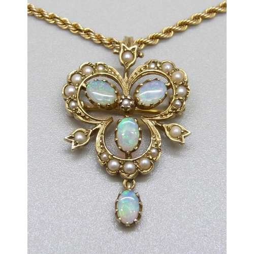 908 - A 9ct gold, opal and pearl pendant/brooch on a 9ct gold chain, 7.3g