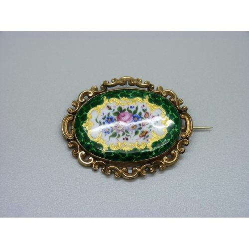 910 - An enamelled c.1900 brooch in original box, 55mm