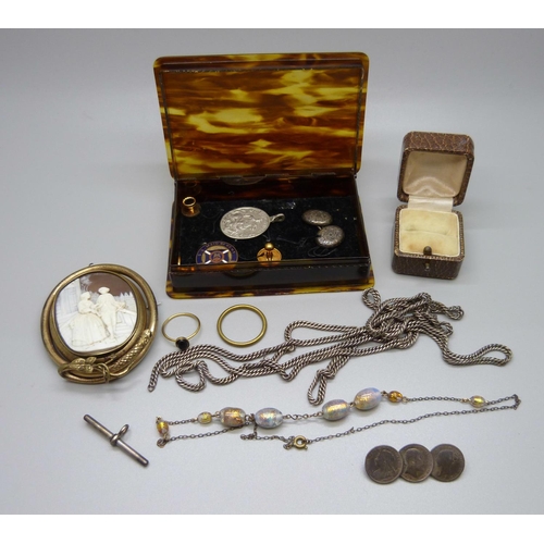 924 - A cameo brooch, a silver T-bar, etc.