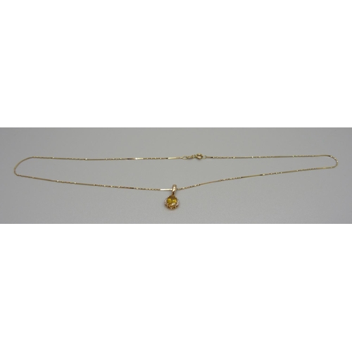 948 - A 9ct gold, sphene and diamond pendant and chain, 2.5g, with certificate