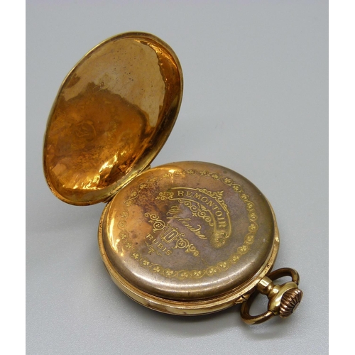 951 - An 18ct gold pocket watch, the case back decorated with horse and jockey and horseshoe, metal inner ... 