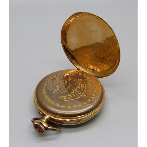 951 - An 18ct gold pocket watch, the case back decorated with horse and jockey and horseshoe, metal inner ... 