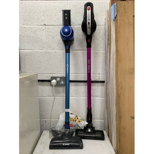 2285 - Hoover and Candy handheld vacuum cleaners with battery, charger and accessories. W