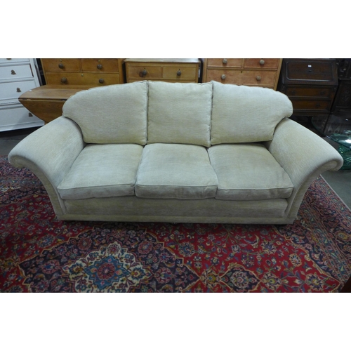 105 - A Duresta Harrington Hogarth two piece sand fabric lounge suite, comprising three seater settee and ... 