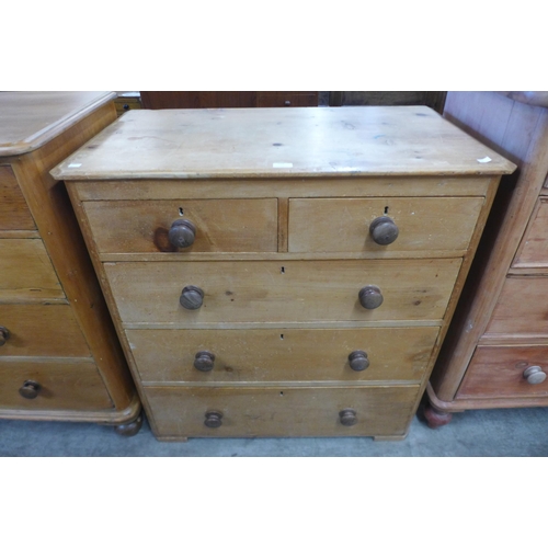 110 - A Victorian waxed pine chest of drawers