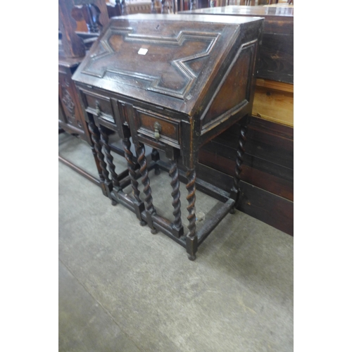 116 - A Victorian Jacobean Revival oak geometric moulded barleytwist bureau