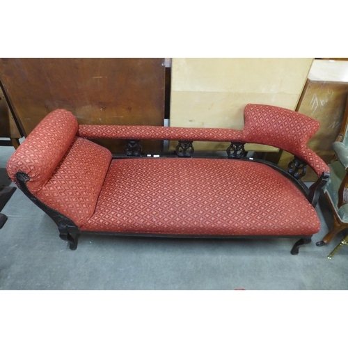 128 - A late Victorian carved beech and fabric upholstered chaise longue and a pair of matching chairs