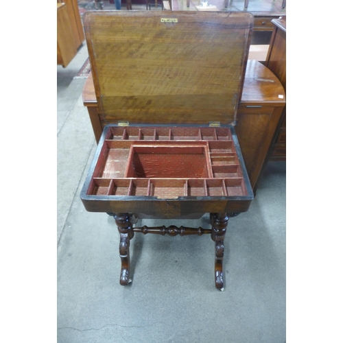 139 - A Victorian inlaid walnut lady's sewing table