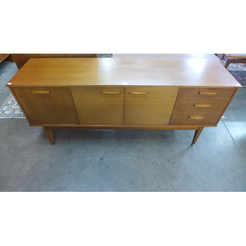 14 - A teak sideboard