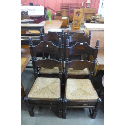 146 - A set of four Dutch oak rush seated chairs