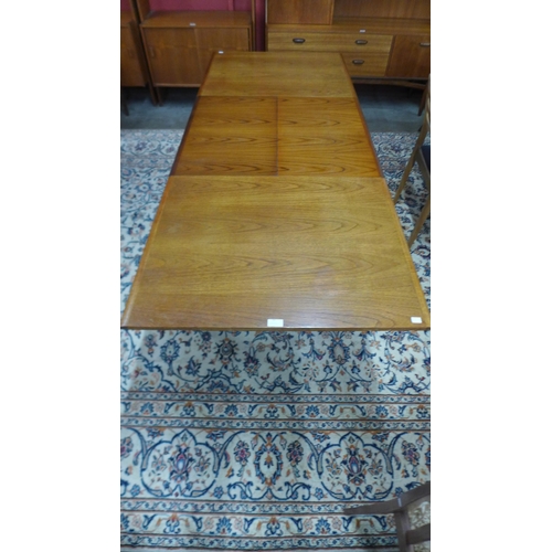 15 - A White & Newton teak extending dining table