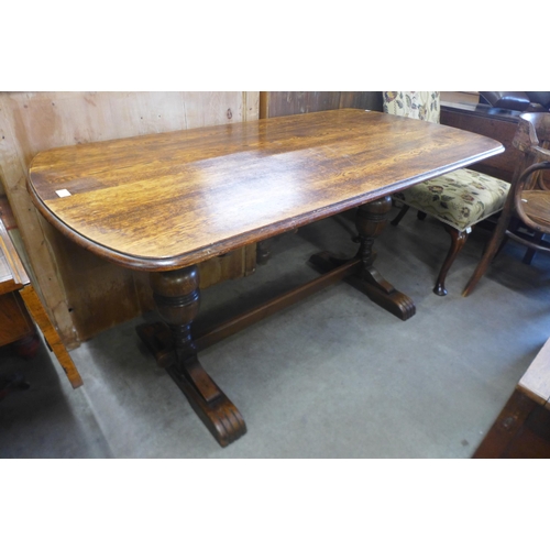 150 - An oak refectory table