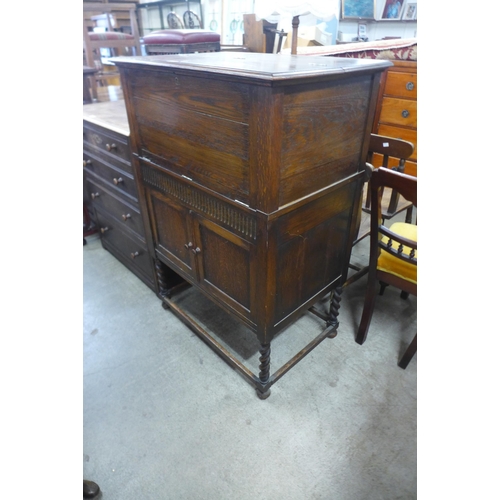 164 - An oak barleytwist cocktail cabinet