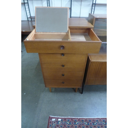 18 - An Avalon teak chest of drawers