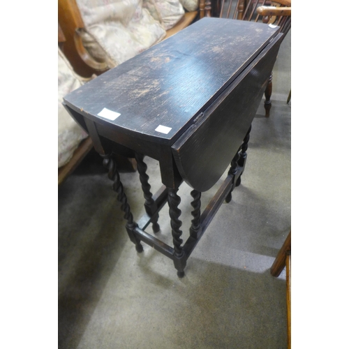 187 - An oak barleytwist gateleg table