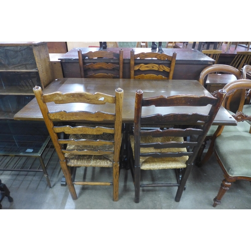 188 - An oak refectory table and four chairs