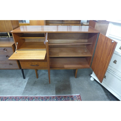 20 - An Avalon teak highboard