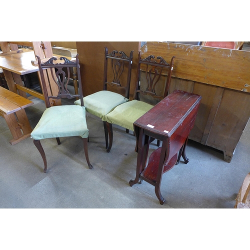 200 - Three Edward VII mahogany chairs and a Sutherland table