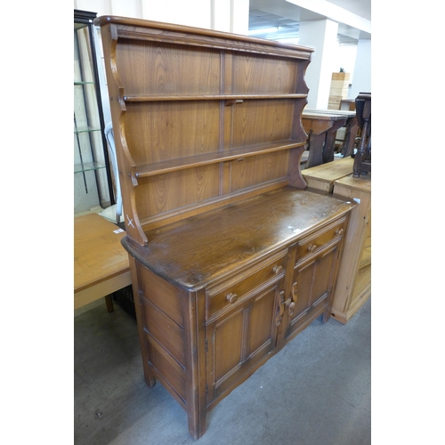 205 - An Ercol Golden Dawn elm dresser