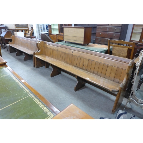 218 - A pair of Victorian pine church pews