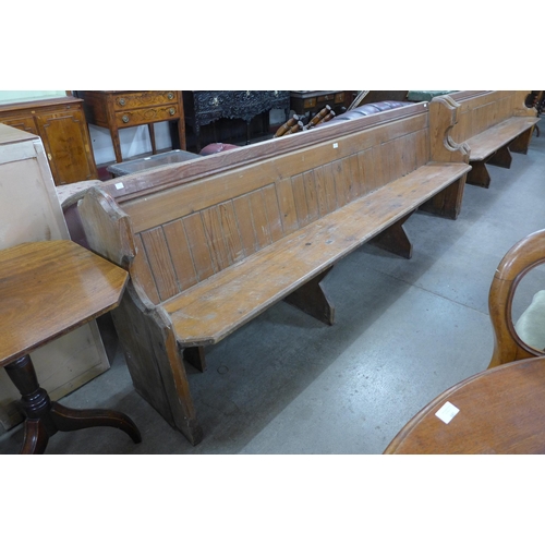 218 - A pair of Victorian pine church pews