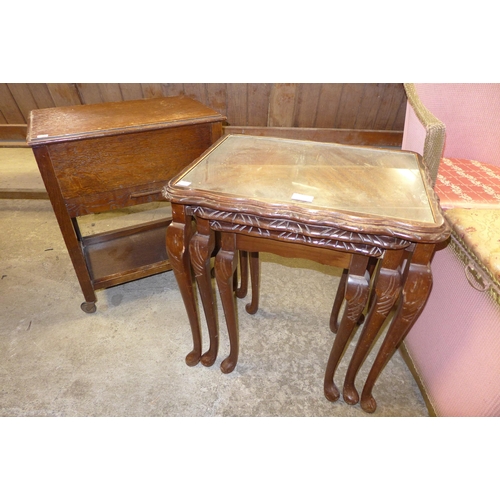 230 - A mahogany nest of tables and an oak sewing box