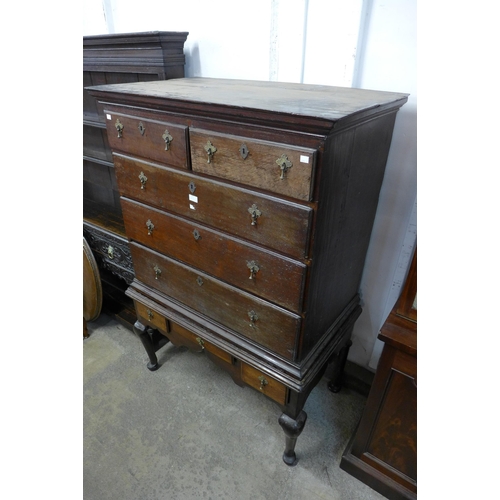 235 - A George II oak chest on stand