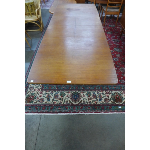 30 - A McIntosh teak T-3 teak extending dining table