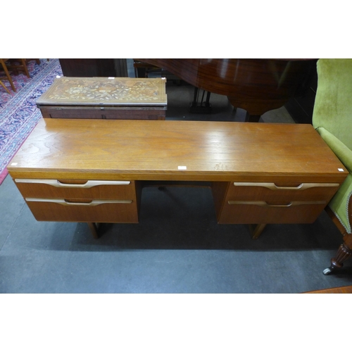 34 - A teak desk